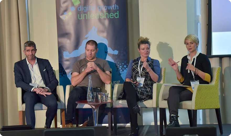 Jenna Tiffany speaking in a panel